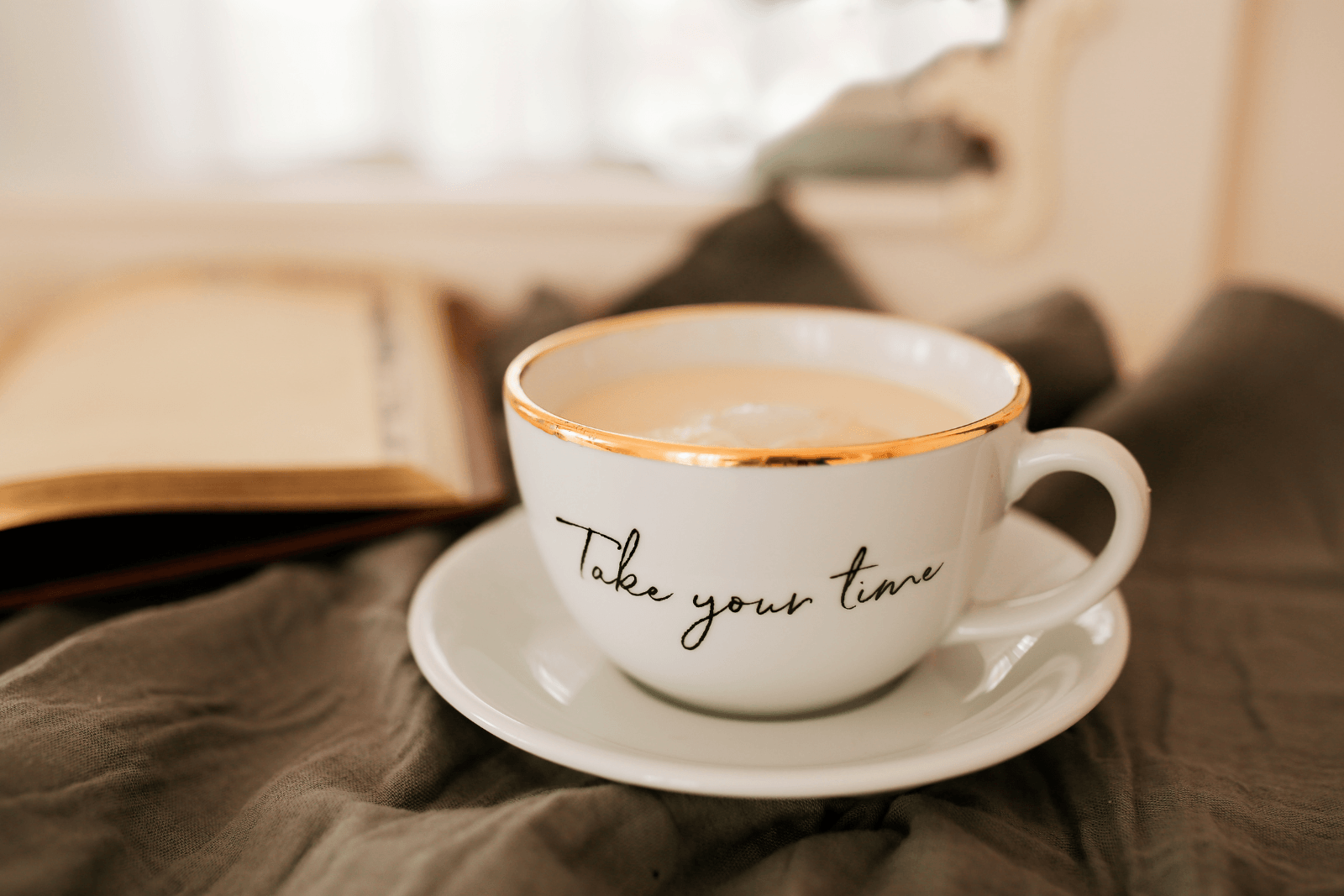 Kaffeetasse mit der Aufschrift Take your Time
